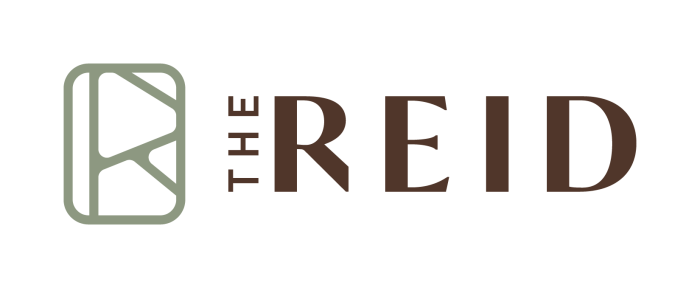 the reid logo on a white background at The  Reid Apartments